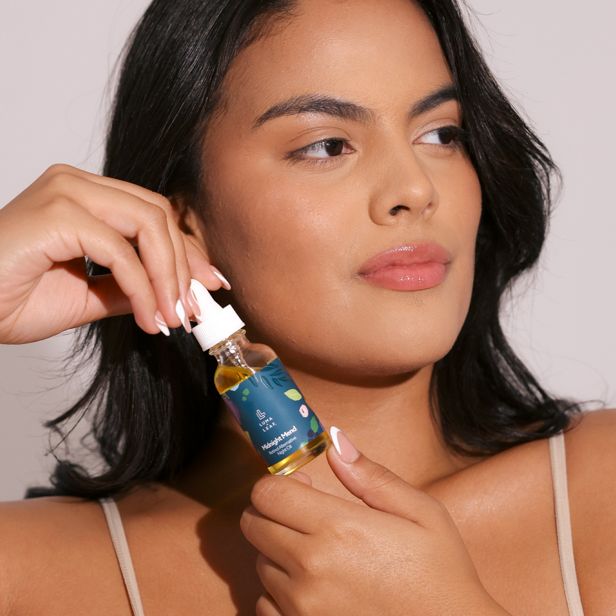 Midnight Mend night oil for aging skin, product bottle
